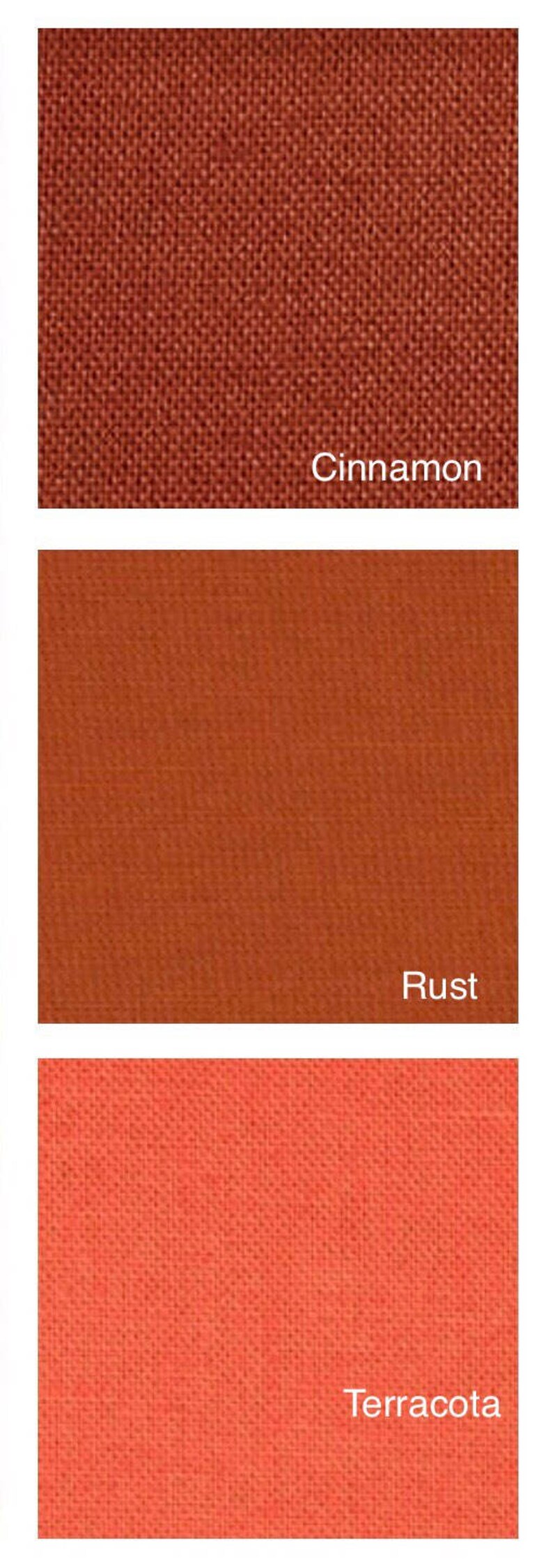 May include: Close-up of three fabric swatches in shades of brown and orange. The top swatch is cinnamon, the middle is rust, and the bottom is terracotta. Each swatch has a textured weave.