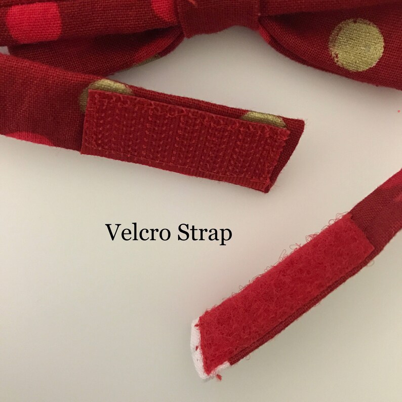 May include: Red bow tie with gold polka dots and a Velcro strap for easy adjustment. The text "Velcro Strap" is visible in the image. This accessory is perfect for pets or people.