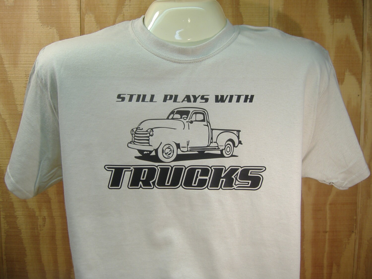 Still Plays With Trucks Funny T-shirt 