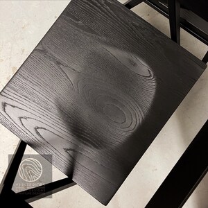 All black Walker dining chair with scooped wooden seat, handcrafted by YJ Interiors