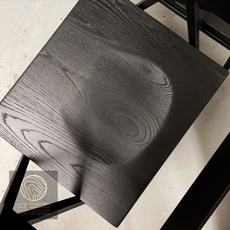 All black Walker dining chair with scooped wooden seat, handcrafted by YJ Interiors