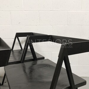 All black Walker dining chair with scooped wooden seat, handcrafted by YJ Interiors