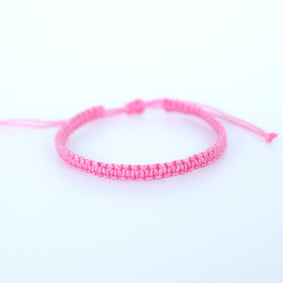 Pink braided bracelet sale