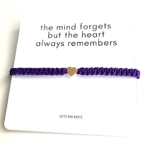 Dark Purple Awareness Bracelet Ribbon Gold Heart Charm Wristband - The Mind Forgets but the Heart Always Remembers'.