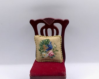Miniature dollhouse cushion with Victorian petit point embroidery on silk gauze.