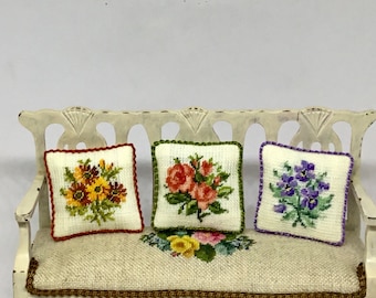 Miniature dollhouse cushion, with petit point flower embroidery on linen canvas.