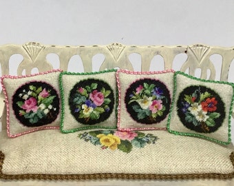 Miniature dollhouse cushion with antique bouquet embroidered in petit point on silk gauze. Scale 1:12