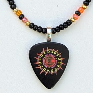 Collar de púa de guitarra de Alice in Chains