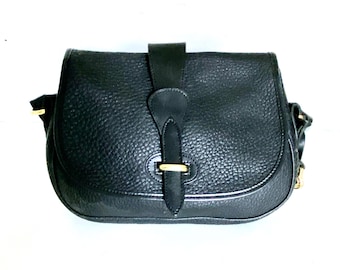 Bolso bandolera vintage de Dooney & Bourke de piel granulada negra