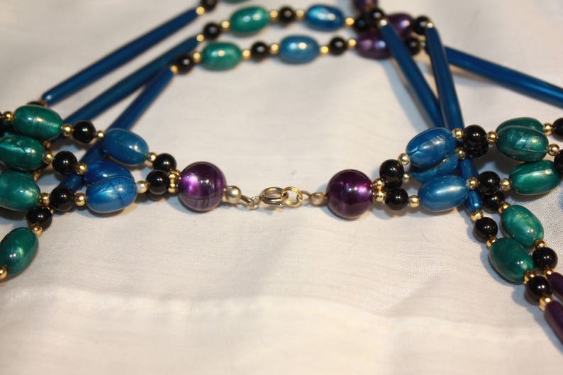 3 Stranded Purple and teal blue peacock colored necklace