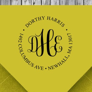 May include: A yellow return address stamp with a black circle and the text "Dorthy Harris", "1492 Columbus Ave", "Newhall, MA 13017", and a monogram "DH" in a script font.