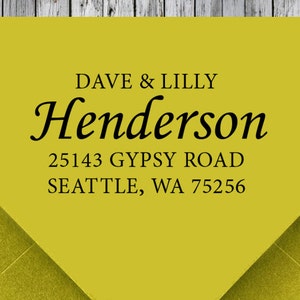 May include: Yellow return address label with black text. The text reads "Dave & Lilly Henderson, 25143 Gypsy Road, Seattle, WA 75256".