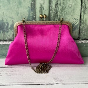 Clutches Gaelle Paris - Logo laminated clutch bag in fuchsia -  GBDA1861FUCSIA