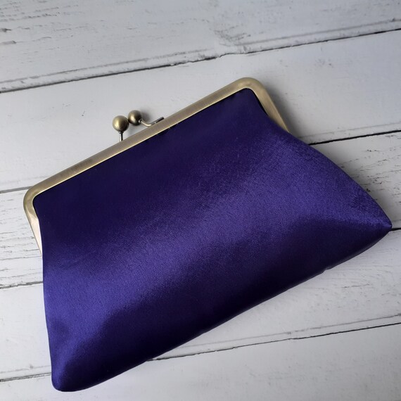 cadbury purple clutch bag
