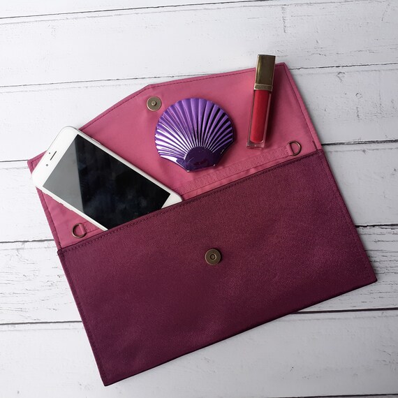 aubergine clutch bag