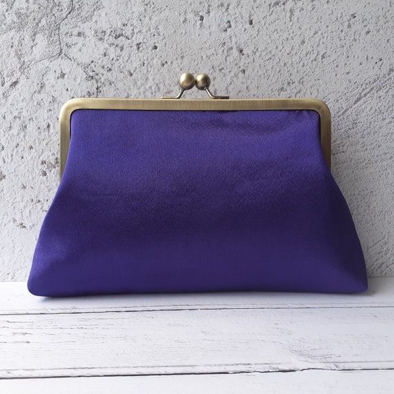 cadbury purple clutch bag