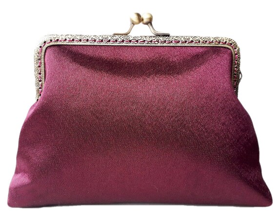 aubergine clutch bag