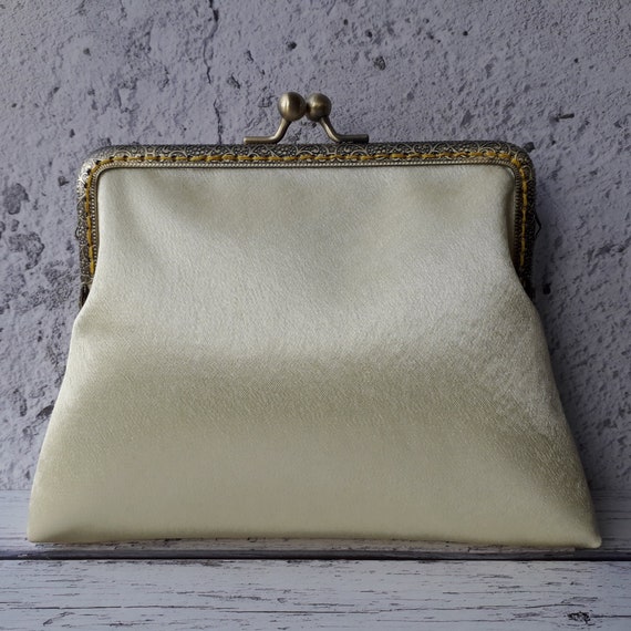 pale yellow clutch bag