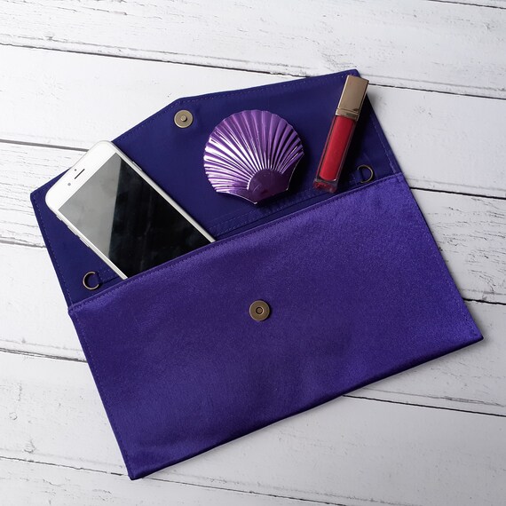 cadbury purple clutch bag