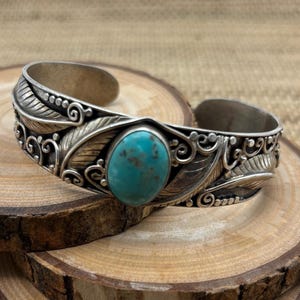 Vintage sterling Navajo detailed cuff with Turquoise focal stone