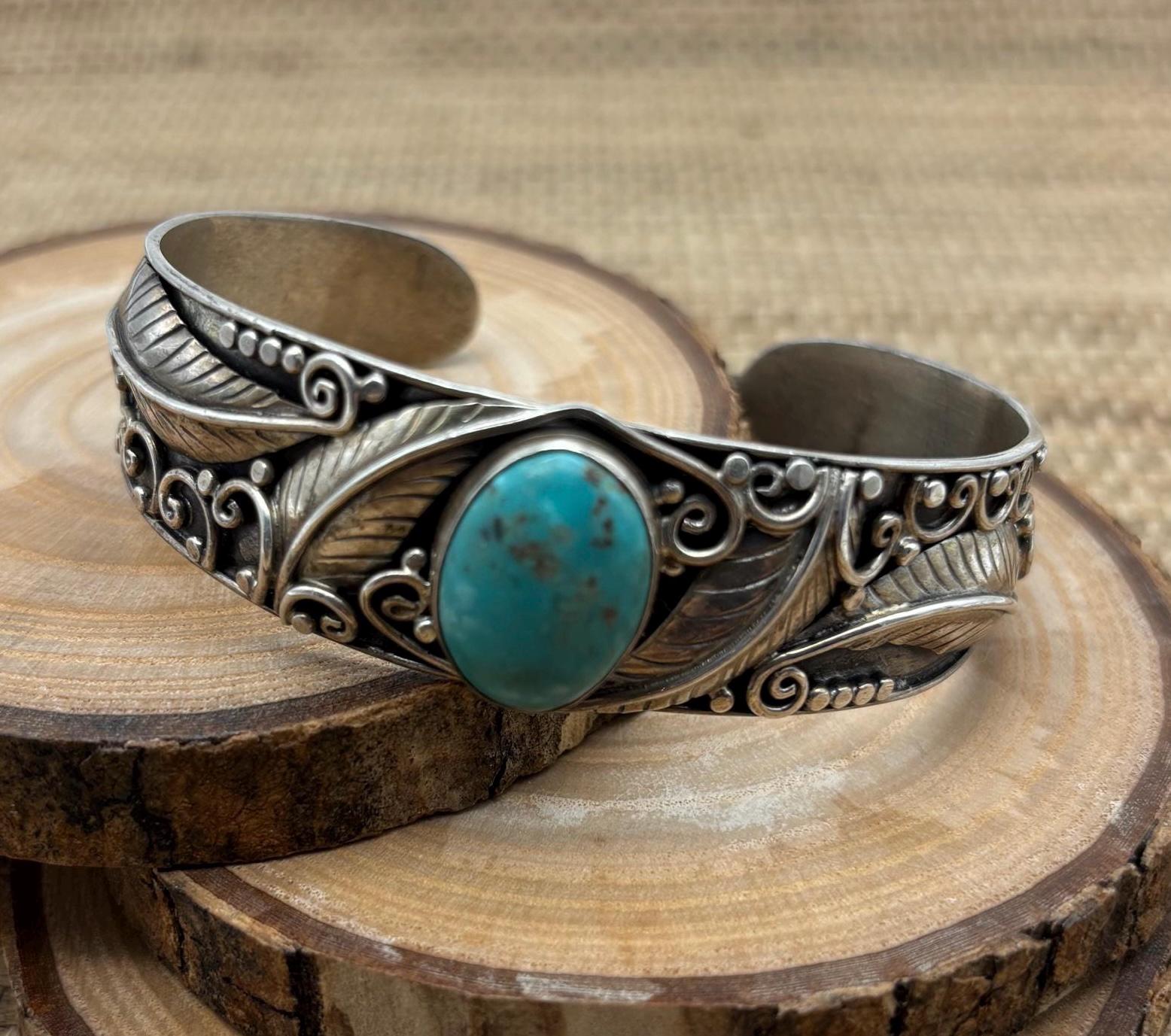 Vintage sterling Navajo detailed cuff with Turquoise focal stone