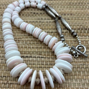 Conch shell graduated disc necklace with vintage Navajo bench beads