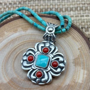 Vintage two strand turquoise native necklace with southwest sterling pendant