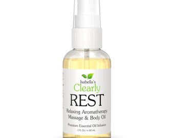 May include: A clear glass bottle with a white pump top dispenser. The bottle contains a yellow liquid and has a white label with green text that reads "Isabella's Clearly REST Relaxing Aromatherapy Massage & Body Oil Premium Essential Oil Infusion 2 FL Oz / 60 ml".