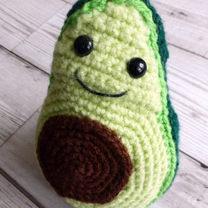 crochet avocado with smiley face