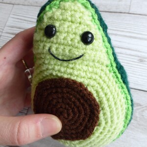 crochet avocado with smiley face