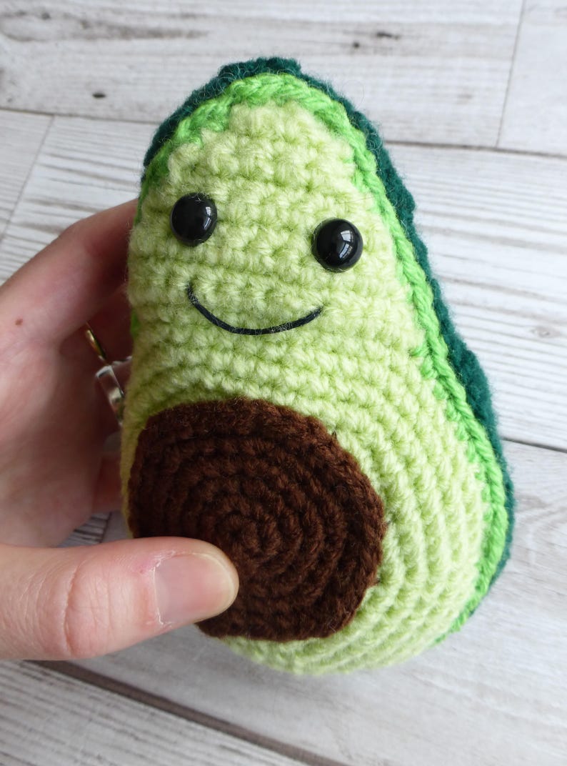 crochet avocado with smiley face