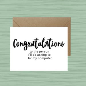 May include: A white card with black text that reads "Congratulations to the person I'll be asking to fix my computer."