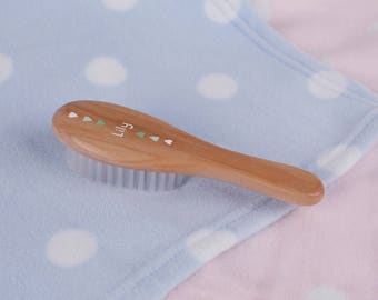 Baby gift - Personalised baby hair brush, hand-painted with a green hearts design.