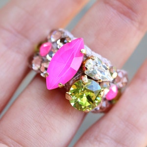 Swarovski crystal summer fashion cocktail stretch knitted band ring for women. In citrus green, lime, and neon pink hot colours.