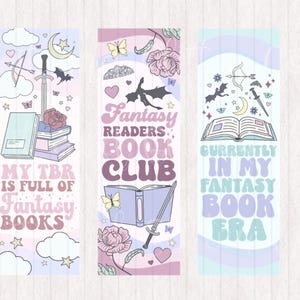 Puede incluir: Tres marcadores de color pastel con temas de club de lectura de fantasía. El primer marcador dice "My TBR is full of Fantasy Books". El segundo marcador dice "Fantasy Readers Book Club". El tercer marcador dice "Currently in my Fantasy Book Era".