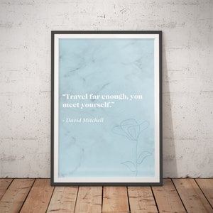 May include: A light blue printable quote poster with a white marble background and a simple line drawing of a flower. The quote reads "Travel far enough, you meet yourself." - David Mitchell.