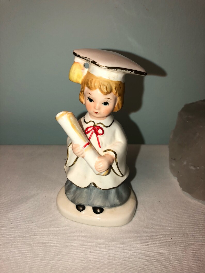 disney graduation figurine