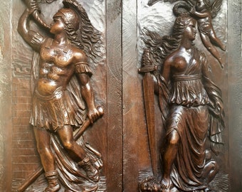 HAND CARVED PANELS - Pair of 19th century hand carved walnut panels of War and Peace allegories from France
