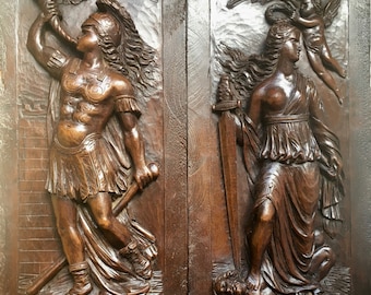 HAND CARVED PANELS - Pair of 19th century hand carved walnut panels of War and Peace allegories from France