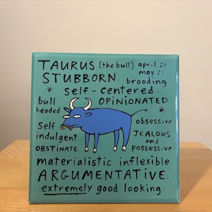 May include: A square, turquoise canvas with the word "TAURUS" and a blue bull illustration. The canvas lists traits like "stubborn," "opinionated," and "argumentative." The text also includes the dates April 21 to May 21.
