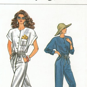 May include: A sewing pattern for a jumpsuit with two different styles. The pattern is for sizes 20-22-24. The pattern is called "Very Easy Very Vogue" and the pattern number is 9950.