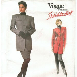 May include: Vogue Patterns Individualist sewing pattern for a long, grey jacket and skirt, and a long, red jacket and pants. The pattern number is 1947. The sewing rating is Average/Moins Facile.