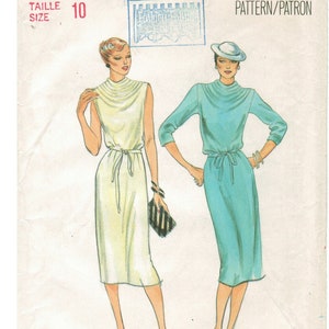 May include: A vintage sewing pattern for a dress with a mock neck and a tie belt. The pattern is for size 10 and is for moderate stretch knits only. The pattern is from Butterick and has the number 6904.