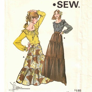 May include: Vintage sewing pattern for a long, tiered skirt with a ruffled top. The pattern is from Kwik Sew Pattern Co., Inc. and is designed by Kerstin Martensson. The pattern is for sizes 6-8-10.