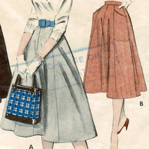 May include: A vintage sewing pattern with skirt illustrations. The central image depicts a woman in a white top, blue scarf, and grey skirt, carrying a blue plaid handbag. Two other skirt designs are also shown.