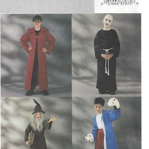 May include: A Butterick pattern featuring four costume designs. The costumes include a red hooded robe, a black monk's robe, a wizard costume with a hat and beard, and a blue robe with boxing gloves. The pattern number is 3989.