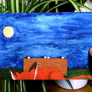 Carte postale - Renard de la pleine lune - Baduk, Weiqi, jeu de go - Renard mignon dormant la nuit à côté d'un plateau de go