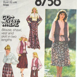 May include: Vintage Simplicity sewing pattern 8756. The pattern includes instructions for a blouse, shawl, vest, and skirt in two lengths. The envelope is blue with illustrations of the finished garments. Bust size 83 cm.