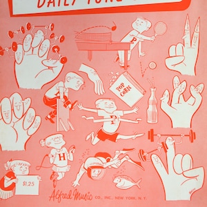 May include: A pink and white illustrated book cover for "Daily Tune-Ups" by Palmer-Hughes. The cover features various cartoon characters playing sports and exercising. The book is part of a series and is labelled "Exercise Book 1".