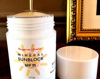 Protector solar en barra con SPF de mandarina y vainilla, totalmente natural, sin nanopartículas y sin recubrimiento de óxido de zinc.